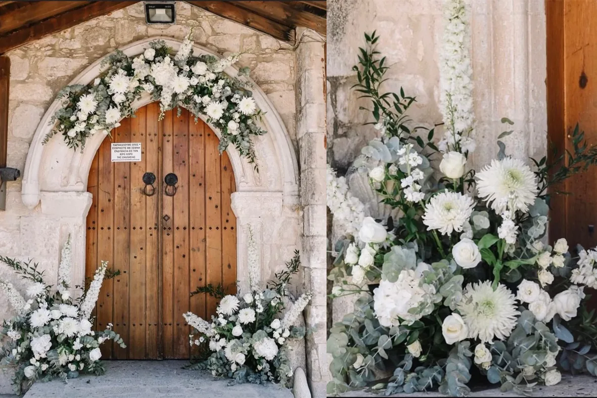White floral decoration at the entrance of a church in Paphos